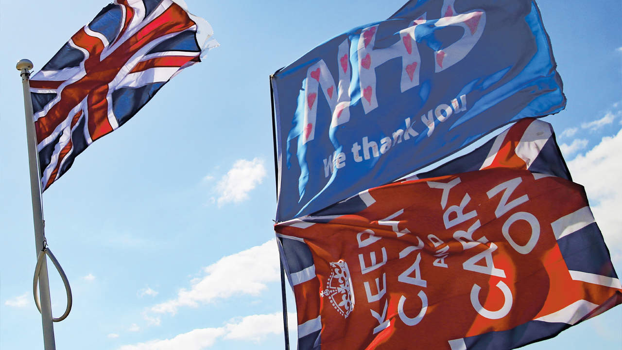 British flags in Worthing pay homage to the National Health Service and display the World War Two slogan ‘Keep Calm and Carry On’.